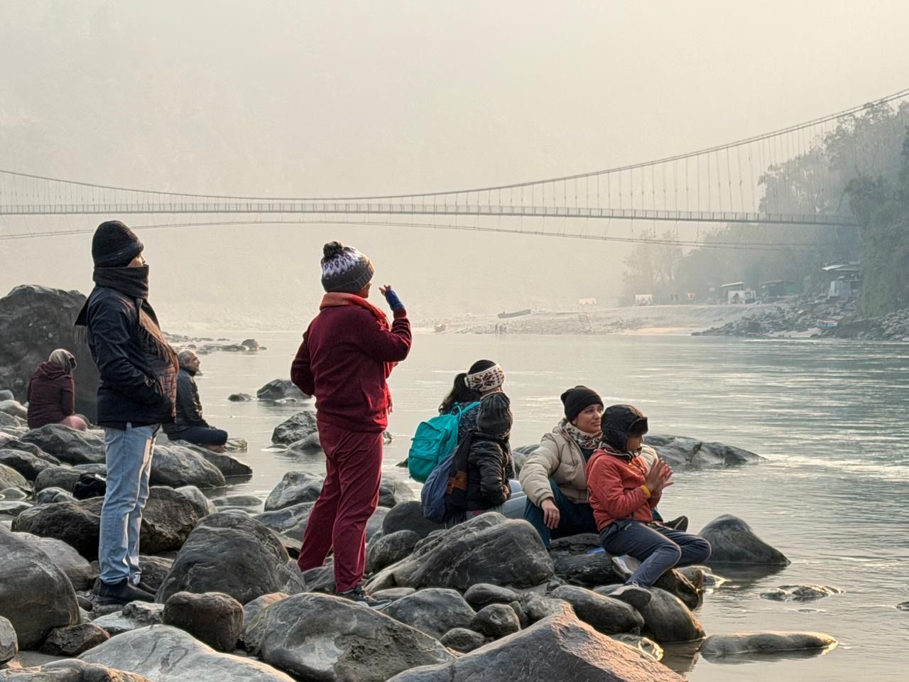 On the rocks by the suspension bridge